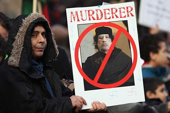 Demonstrators opposed to the regime of Libyan leader Col Muammar Gaddafi gather in Hyde Park, London.