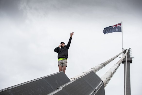 A protester on top of the Westgate Bridge.