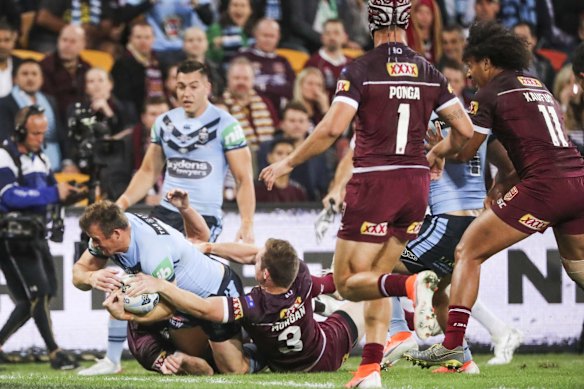 Josh Morris of the Blues scores a try.