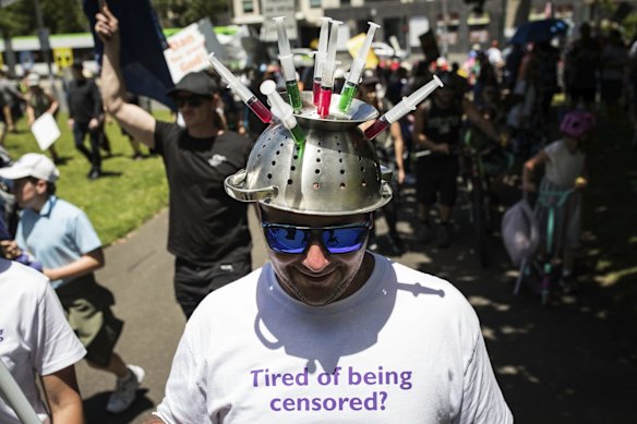 Protesters attend the Melbourne Freedom rally in the CBD
