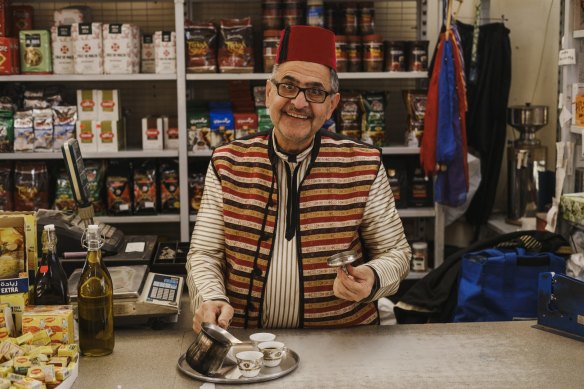 Valley View Continental Spices & Groceries owner Ali Hamad pours some coffee for us.