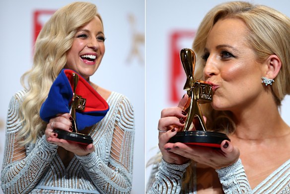 Carrie Bickmore with her Gold Logie and the blue beanie she wore on stage.