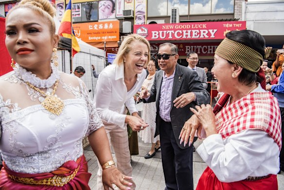 Kristina Keneally shares a laugh with members of the Cambodian community in Cabramatta.