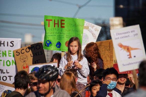 An estimated crowd of five thousand gathered at Treasury Gardens on Friday for Climate Strike, a rally and march organised by School Strike 4 Climate after the recent federal budget announcement. 