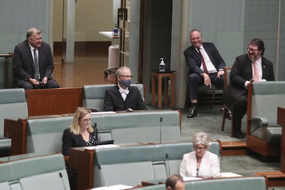Cross-party backbench discussions across the aisle - Labor's Joel Fitzgibbon, former Liberal Craig Kelly and the Nationals' Barnaby Joyce and George Christensen during question time on Wednesday.