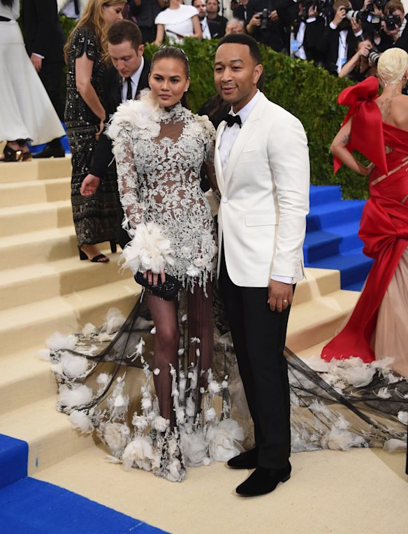 Chrissy Teigen, left, and John Legend attends The Metropolitan Museum of Art's Costume Institute benefit gala celebrating the opening of the Rei Kawakubo/Comme des Garcons: Art of the In-Between exhibition on Monday, May 1, 2017, in New York