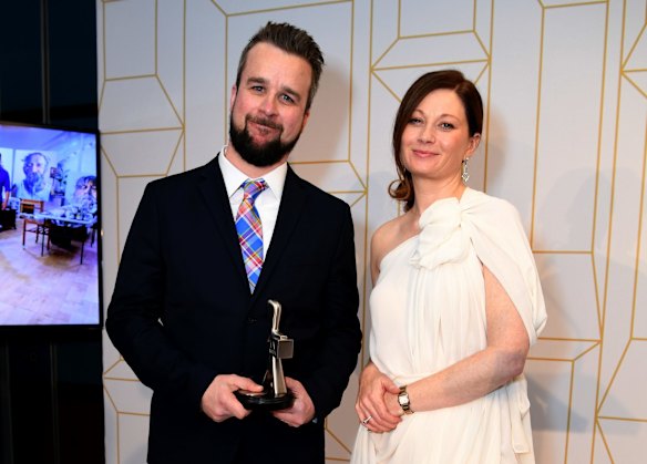 Four Corner's Justin Stevens and Morag Ramsay pose with their Logie award for the most outstanding news coverage.