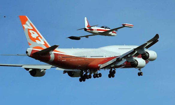 The 747-8 Intercontinental, Boeing's largest-ever passenger airplane, takes off for the first time from Paine Field in Everett, USA.