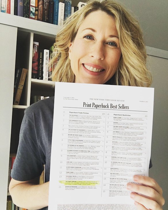 Lester with the 2019 NYT bestseller list on which she debuted. She bought a Tiffany & Co. watch to celebrate.