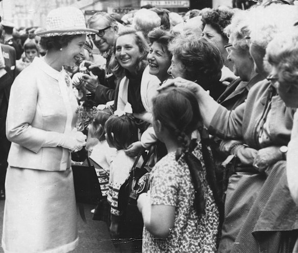 The Queen and the royal family took a walk along Collins Street from the Town Hall where the enthusiastic crowd swarmed around the visitors.6th April, 1970.