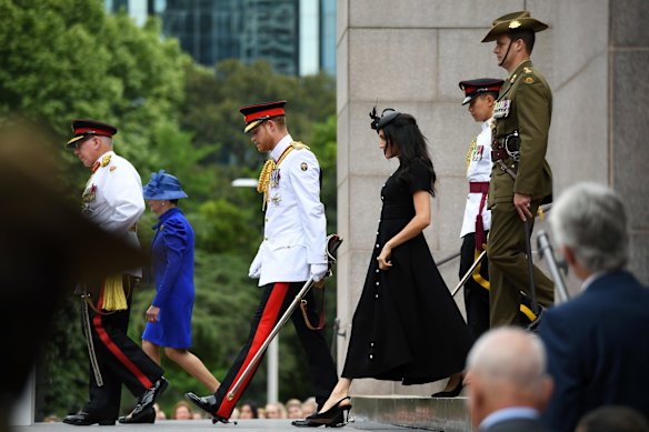Britain's Prince Harry, the Duke of Sussex and his wife Meghan, the Duchess of Sussex attend the official opening of Anzac Memorial at Hyde Park, Sydney.