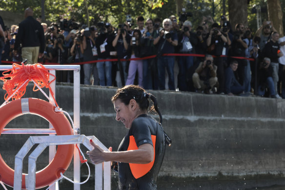 Paris Mayor Anne Hidalgo takes a dip in the Seine to show it is safe for swimming.