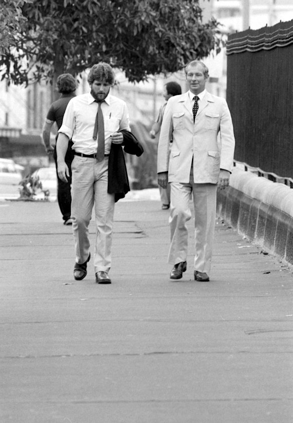 NSW Detective Roger Rogerson (right) and Herald police reporter Neil Mercer in Darlinghurst in Sydney's east in December 1982.