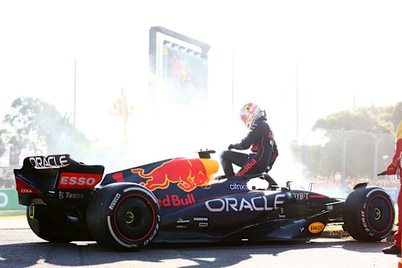Max Verstappen of the Netherlands and Oracle Red Bull Racing climbs from his car after retiring from the race.