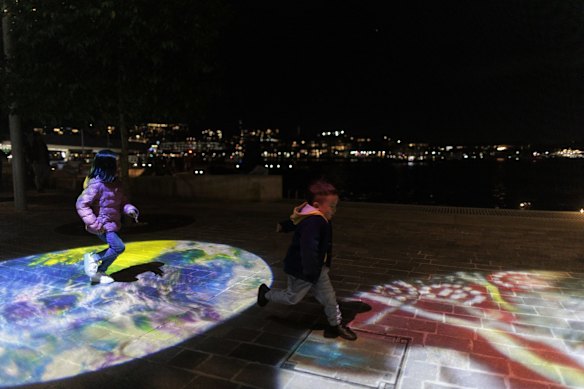 Children explore the Vivid lights during the opening night of Vivid 2022. 