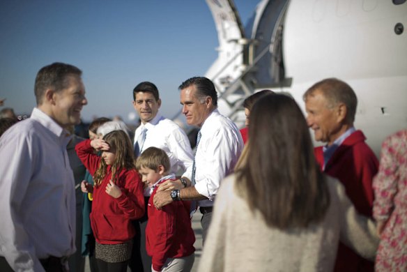 Mitt Romney and his running mate Paul Ryan at an airport in Ohio