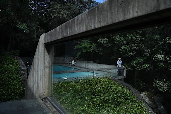 Penelope Seidler beside the pool in the backyard at her home in Kilara.