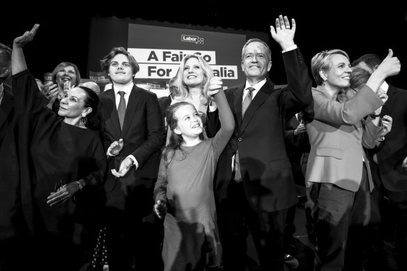 Bill Shorten with his family and colleagues at a campaign rally.