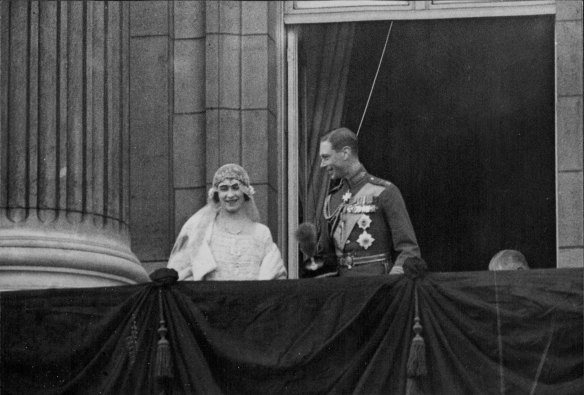 The Duke and Duchess of York, later to reign over the British Commonwealth of Nations, acknowledge the acclaim of loyal citizens from the balcony of Buckingham Palace after their wedding. 
