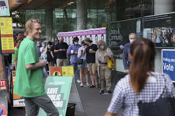 Constituents queue to vote at the Surry Hills Library, during local council elections.