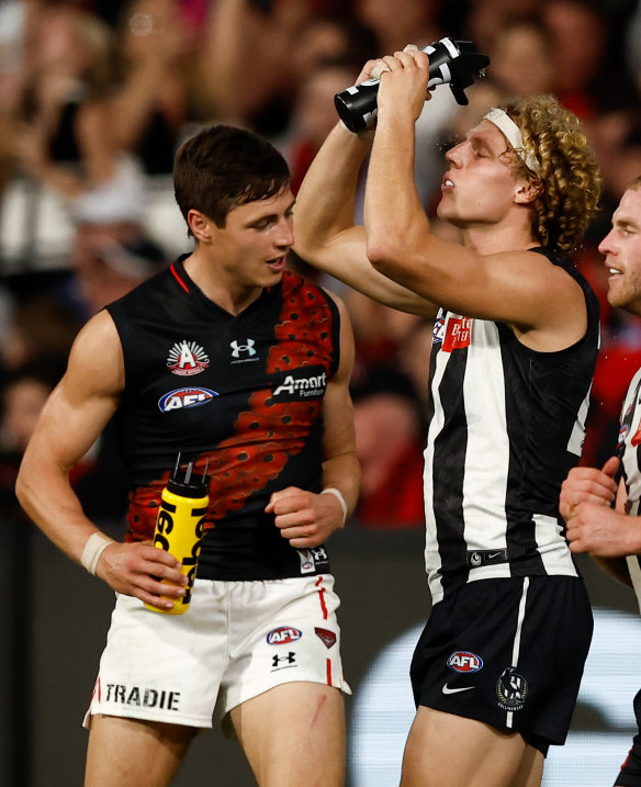 Essendon’s Jake Kelly and Collingwood’s Will Kelly.