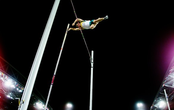 Australia's Paul Burgess clearing the bar during the men's pole vault qualifying.