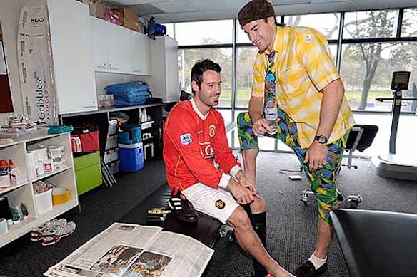 Collingwood footballers Alan Didak and Darren Jolly during Mad Monday celebrations after the Magpies won their first premiership in 20 years against St Kilda.