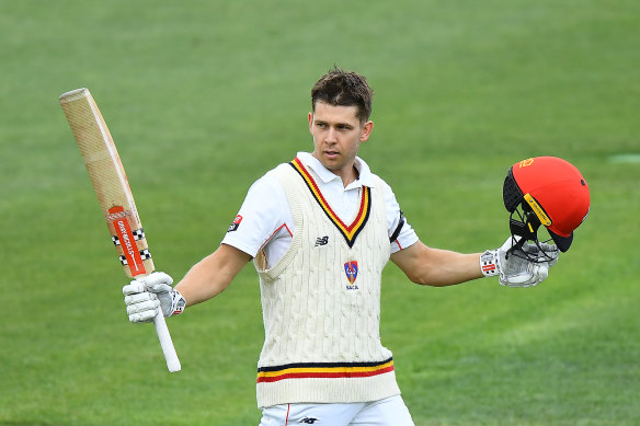 In line: Henry Hunt celebrates a century for the Redbacks.