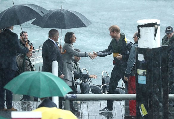 Prince Harry is met by NSW Premier Gladys Berejiklian at Campbells Cove on June 7, 2017 in Sydney, Australia.
