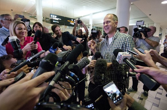 Peter Greste greets his supporters and the media after landing back in Australia at Brisbane Airport.