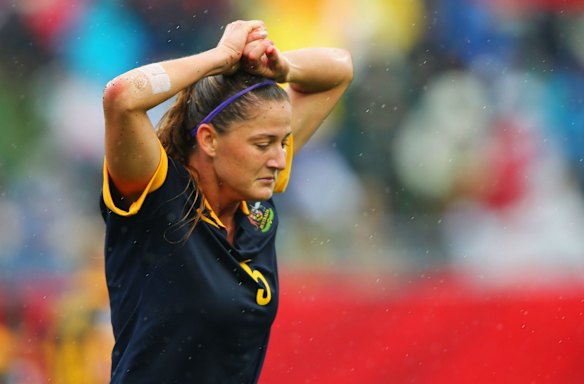 Laura Alleway of Australia reacts after a tackle.
