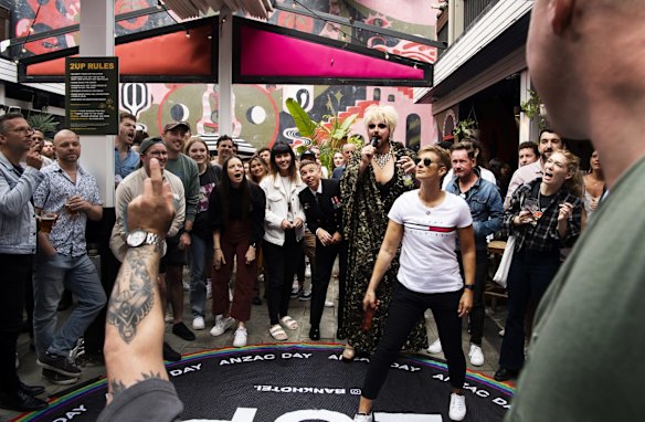 Two-up hosted by drag queen, Tora Hymen, at The Bank,  Newtown. Anzac Day. 25th April 2022 Photo Louise Kennerley
 SMH