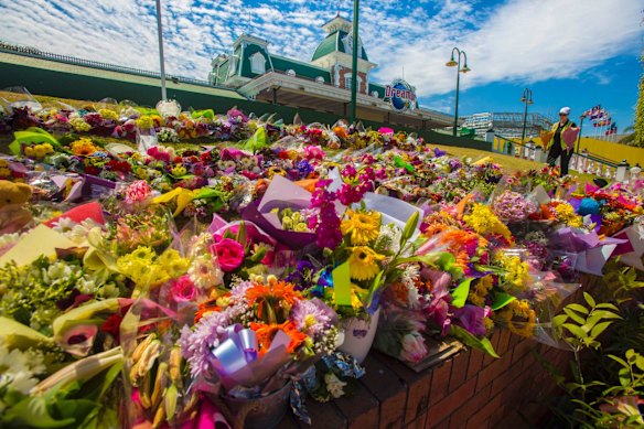 Flower tributes at Dreamworld where four people died after a malfunction with the 'Thunder River Rapids' at the theme park.