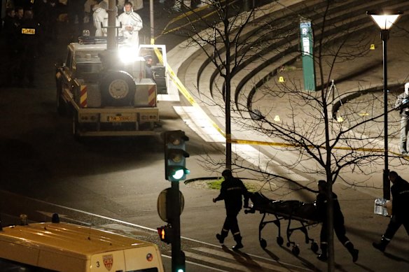 A body is wheeled away from a kosher grocery store. A Paris prosecutor said that gunman Amedy Coulibaly killed four people when he entered the kosher market in eastern Paris.