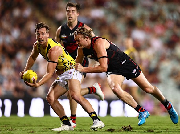 Kane Lambert is challenged by Mason Redman.