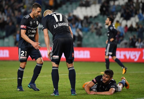 Despair: Terry Antonis (right) after his late own goal in last year's A-League finals.