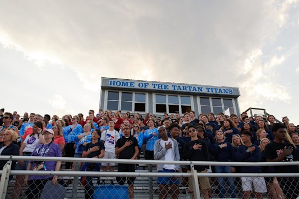 Opening ceremony at the Relay For Life - a cancer fundraiser at Tartan High School athletic field in Oakdale, Minnesota, USA.