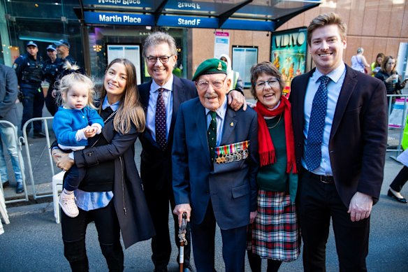Four generations (right to left) Sam Wilkinson, Susie Rowe, John Wilkinson, 100yrs old, Peter Wilkinson, Katie Steyn and Imogen Steyn, 4, before ANZAC Day march down Elizabeth St, Sydney.