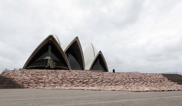 Naked volunteers pose for  Spencer Tunick in front of the Sydney Opera House.