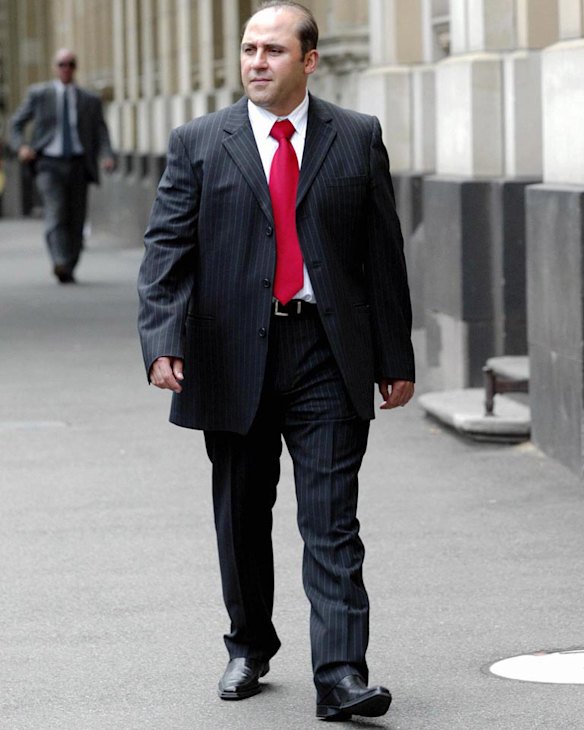 Tony Mokbel leaves the Supreme Court on his way to the County Court after an earlier hearing.