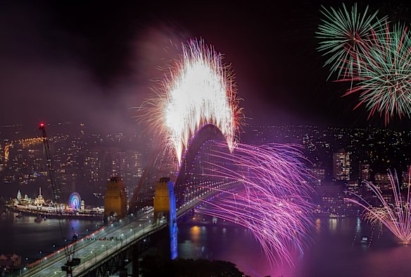 At midnight, a colourful display with bursts of neon, pastel and spinning fireworks blast into the sky to a soundtrack created by electronic music duo The Presets.