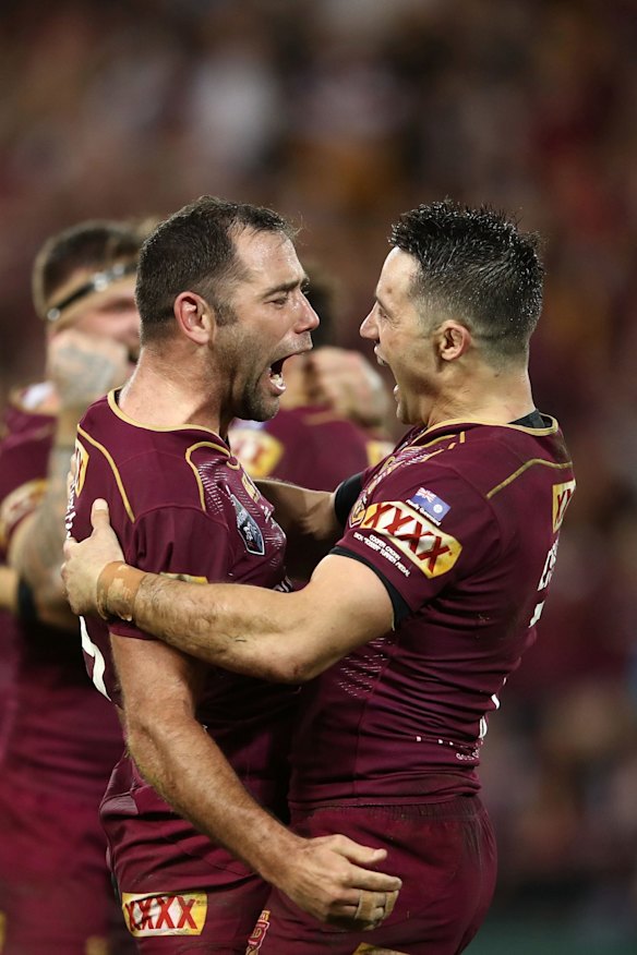 Cameron Smith and Cooper Cronk of the Maroons celebrate winning game three of the State Of Origin series.