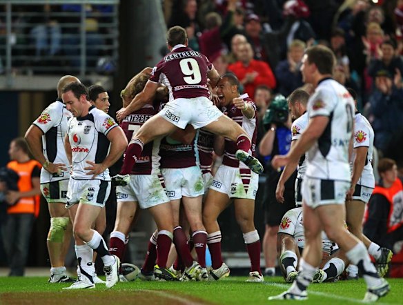 NRL. Grand Final 2011. Manly Sea Eagles vs New Zealand Warriors. ANZ Stadium. Matt Ballin and the Sea Eagles celebrate Jamie Lyon's game sealing try. Sunday 2nd October, 2011.