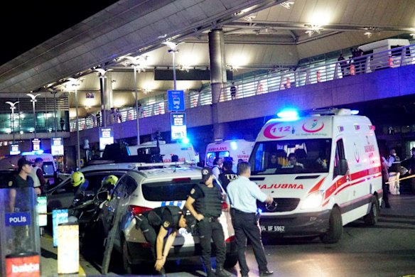 Turkish security officers and ambulances gather outside Turkey's largest airport, Istanbul Ataturk, after it was hit by a suicide bomb attack in Istanbul, Turkey.