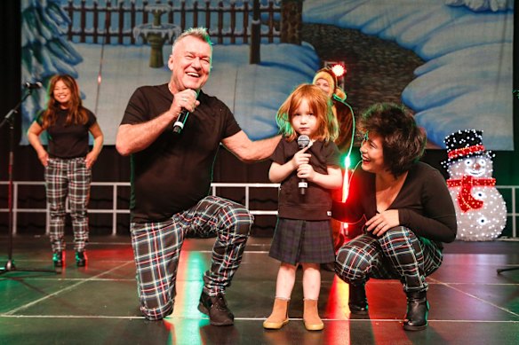 Jimmy Barnes, his daughter Elly-May and grandson Dylan perform at the Variety Kids Xmas Party at the International Convention Centre Sydney on Tuesday, November 21, 2017.
