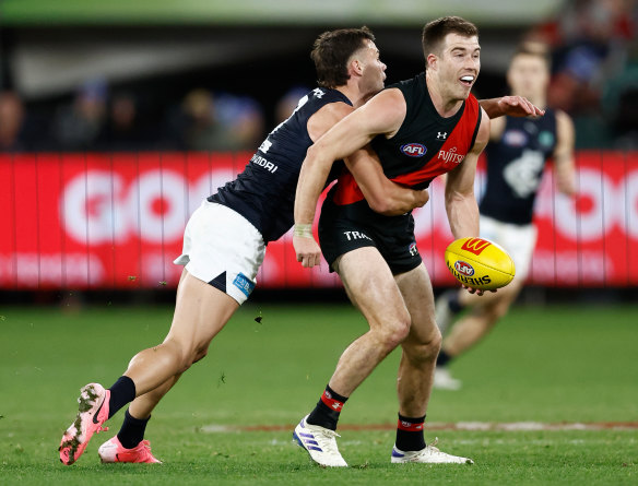 Hang on: The Blues were able to quell Zach Merrett, but the Essendon skipper needs to get moving if his team is to push for a top-four finish.