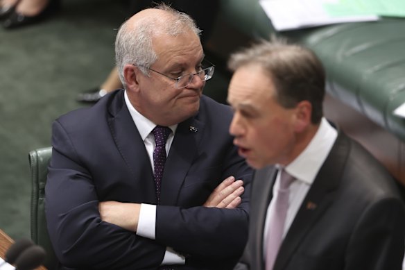 Prime Minister Scott Morrison and Health and Aged Care Minister Greg Hunt during question time at on Thursday 3 June.