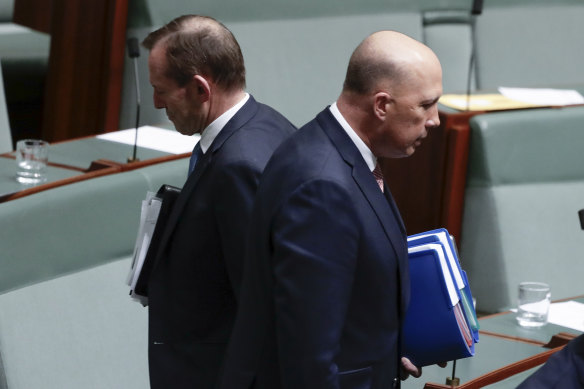 Got each other's back::  backbenchers Tony Abbott and Peter Dutton. 