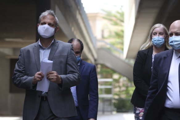 Victorian Chief Health Officer Brett Sutton and Treasurer Tim Pallas arrive for the daily COVID-19 update at Treasury Theatre. 08 Oct 2021