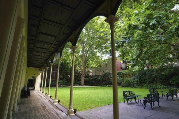 The club’s colonnaded verandah opens out onto the garden.